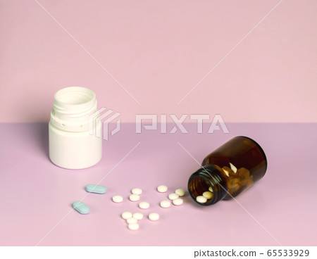 Home treatment. Different pill bottles 65533929