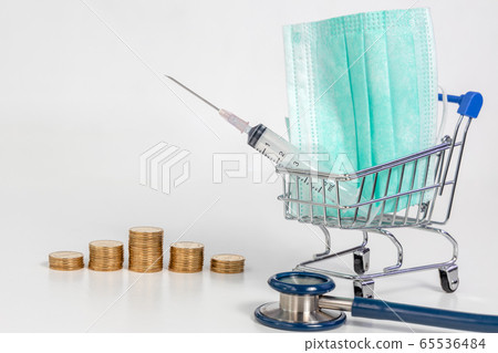 gold coins in a row with protective medical mask gold coins in a row with protective medical mask 65536484