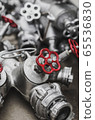 Industrial valves with red wheels. close-up  65536830