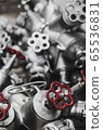 Industrial valves with red wheels. close-up  65536831