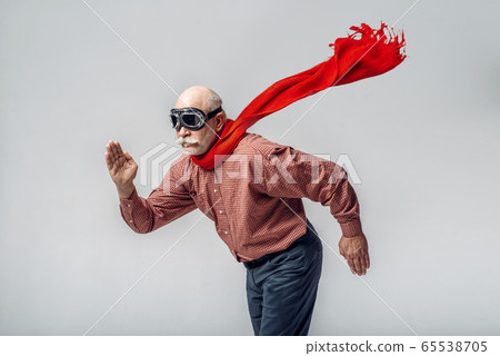 Elderly man in a red scarf and pilot glasses Elderly man in a red scarf and pilot glasses 65538705
