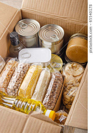 Set of uncooked foods in carton box prepared for 65540178