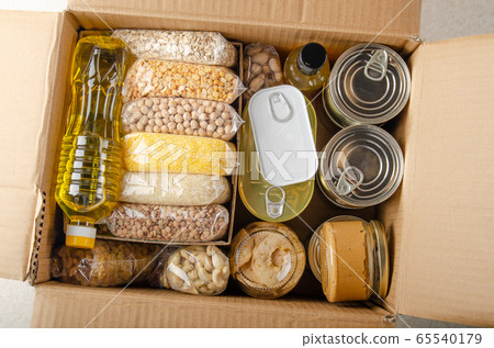 Flat lay view at uncooked foods in carton box Flat lay view at uncooked foods in carton box 65540179