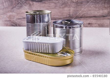 Set of various canned foods in tin cans on kitchen Set of various canned foods in tin cans on kitchen 65540180