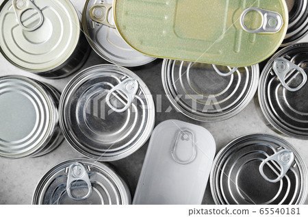 Flat lay view at various canned foods in tin cans 65540181