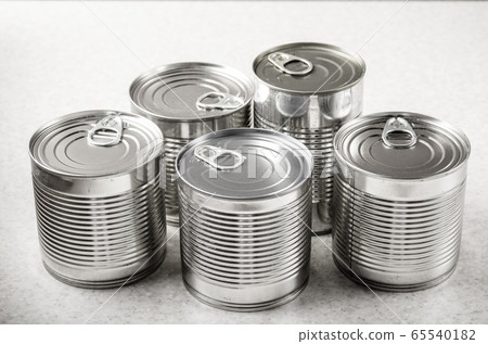 Set of various canned foods in tin cans on kitchen Set of various canned foods in tin cans on kitchen 65540182