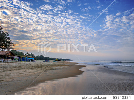India, Goa. Early morning on the beach Colva. India, Goa. Early morning on the beach Colva. 65540324
