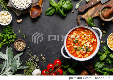 Cooking pasta e fagioli soup with chicken meat and 65543006