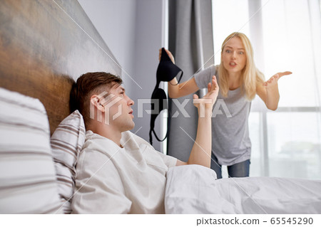 we are going to get divorced disappointed woman and man on bed we are going to get divorced disappointed woman and man on bed 65545290