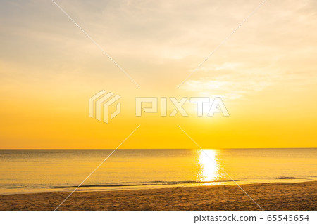 Beautiful tropical nature beach sea ocean at sunset or sunrise Beautiful tropical nature beach sea ocean at sunset or sunrise 65545654