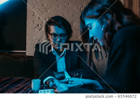 reading the lines hand in a business man's hands 65546072