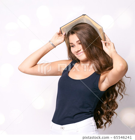 Happy girl. Student. New knowledge Happy girl. Student. New knowledge 65546241