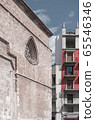 Street in the center of a European city with architecture of different eras, Spain 65546346