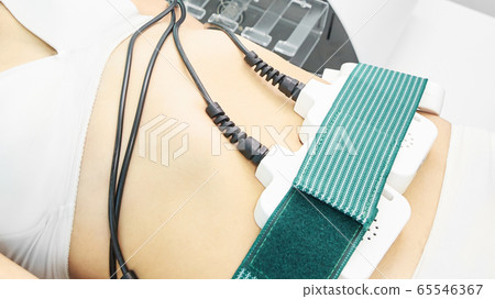 Laser lipo equipment. Cosmetic fat reduce treatment. Woman in medicine salon. Anti cellulite procedure 65546367