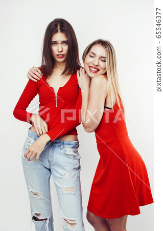 best friends teenage girls together having fun, posing emotional on white background, besties happy smiling, lifestyle real people concept 65546377