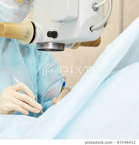 Ophthalmology laser microscope operation. Doctor in clinic. Patient eye treatment. Myopia and cataract removal Ophthalmology laser microscope operation. Doctor in clinic. Patient eye treatment. Myopia and cataract removal 65546412