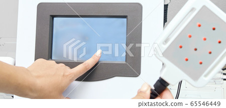 Laser lipo equipment. Cosmetic fat reduce treatment. Woman in medicine 65546449