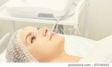 Dermatology skin care facial therapy. Medical spa anto wrinkles procedure. Woman face rejuvenation. Dermatology skin care facial therapy. Medical spa anto wrinkles procedure. Woman face rejuvenation. 65546482