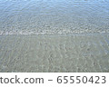 Clear sea water on the beach ① 65550423