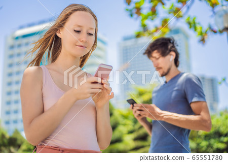 contact tracing app COVID-19 pandemic Coronavirus Mobile Application - people wearing face mask contact tracing app COVID-19 pandemic Coronavirus Mobile Application - people wearing face mask 65551780