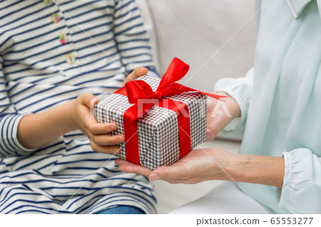 Three generations family mothers day present family image 65553277