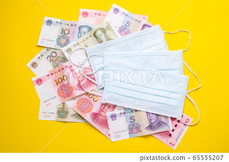 Chinese banknote (Yuan) and new white mask on 65555207