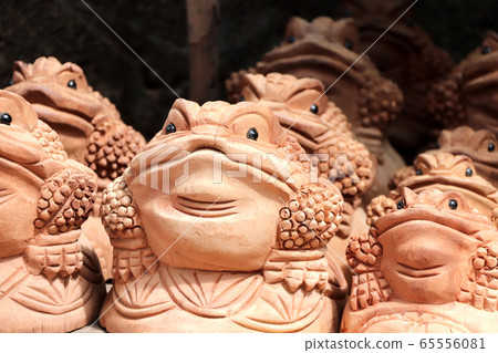 Traditional cambodian handmade souvenirs - wooden toads 65556081