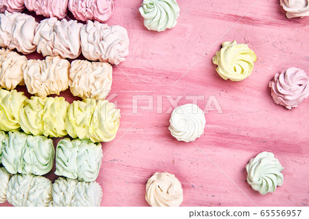 Sweet homemade marshmallow, background from multicolor pastel zephyr Sweet homemade marshmallow, background from multicolor pastel zephyr 65556957