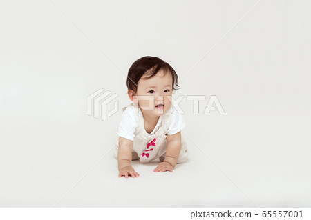 Smiling baby girl Smiling baby girl 65557001