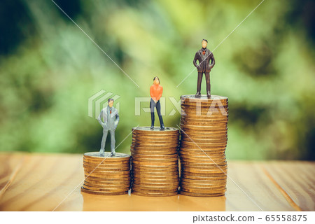 Miniature people, small figures businessmen and Miniature people, small figures businessmen and 65558875