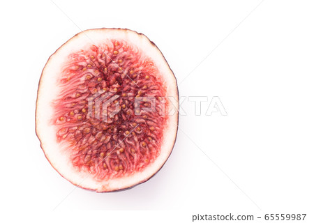 Cut in half fresh fig isolated on white 65559987