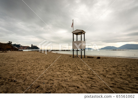 Empty beach in winter Lerici town - Gulf of La Spezia Liguria Italy Empty beach in winter Lerici town - Gulf of La Spezia Liguria Italy 65561002