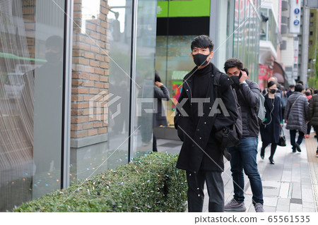 Lifestyle of young men in big city and corona virus spreading period concept 65561535