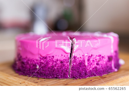 Pink and violet birthday cake. Dessert, holidays and delicious concept. Pink and violet birthday cake. Dessert, holidays and delicious concept. 65562265