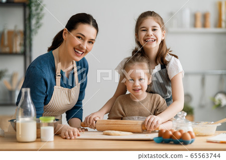 family are preparing bakery together family are preparing bakery together 65563744