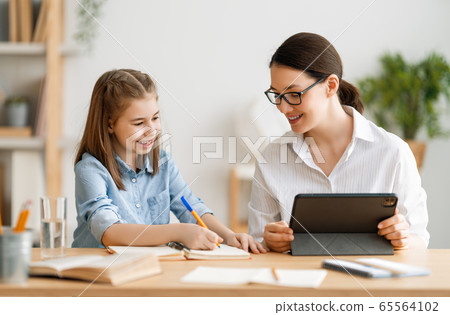 Happy loving family are preparing bakery together. Happy loving family are preparing bakery together. 65564102