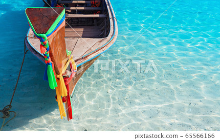 Thailand traditional longtail boat on tropical 65566166