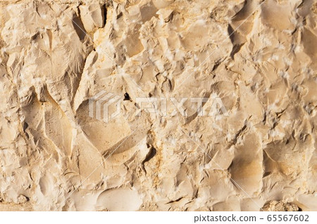 Wall sandstone texture background. Yellow old grunge surface, stone vintage texture. Voluminous background 65567602