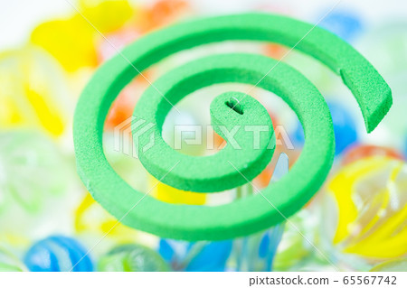 Mosquito coil and colorful marbles 65567742
