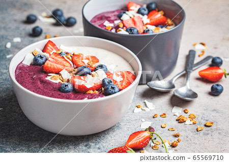 Berry smoothie bowl with granola, strawberry Berry smoothie bowl with granola, strawberry 65569710