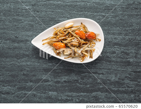 Fried anchovy with peanut and almond, one of the traditional Korean food 65570620