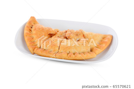 pizza puff isolated on white plate 65570621