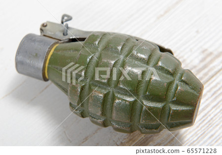 Hand grenade in green color Hand grenade in green color 65571228