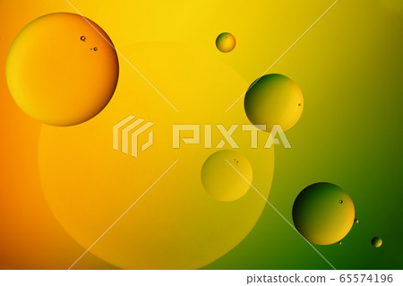 Oil drops on a water surface. Oil drops on a water surface. 65574196