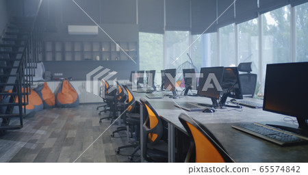 An empty workplace with computers An empty workplace with computers 65574842