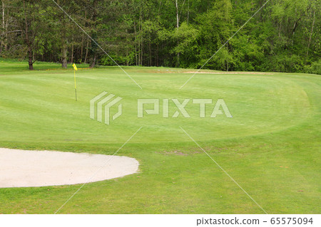Sand bunkers on the golf course Sand bunkers on the golf course 65575094