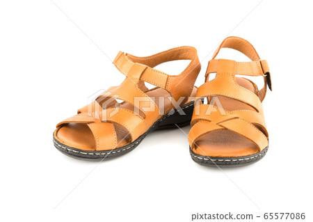 Pair of brown shoes Pair of brown shoes 65577086