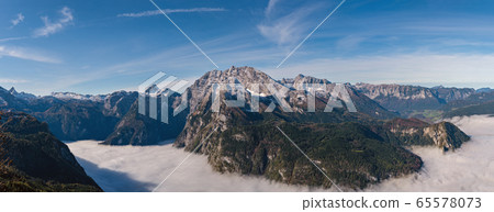 Autumn Alps mountain misty morning view from Autumn Alps mountain misty morning view from 65578073