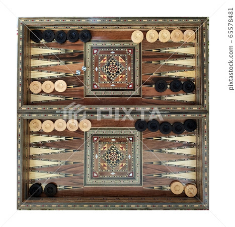 Backgammon with wooden inlay. Wooden backgammon board game of pearl inlaid on brown background Backgammon with wooden inlay. Wooden backgammon board game of pearl inlaid on brown background 65578481