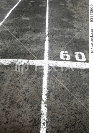 Marking lines and numbers on the asphalt surface 65578600